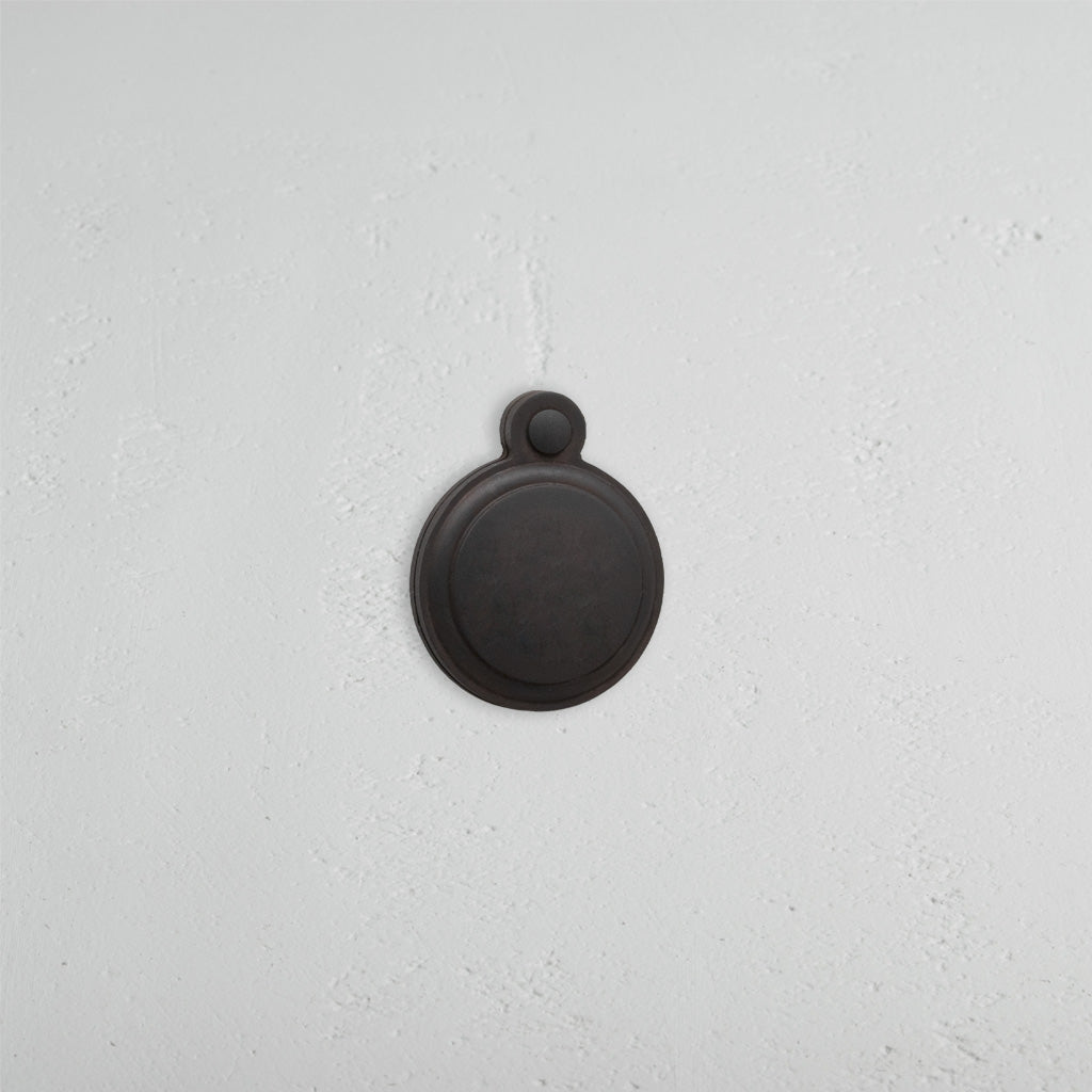 Bronze Canning Covered Key Escutcheon On White Background