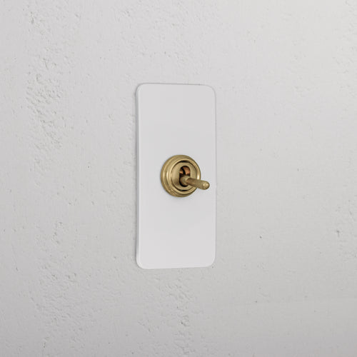 1G Architrave Two Way Toggle Switch - Paintable Antique Brass