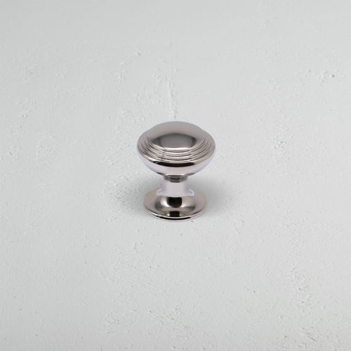 Polished Nickel Barlow Furniture Knob On White Background