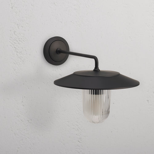 Kensington Wall Light Fluted Glass – Bronze: medium wall light with ribbed glass shade and bronze finish.