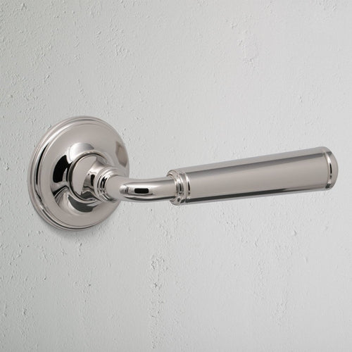 Polished Nickel Digby Unsprung Door Handle On White Background