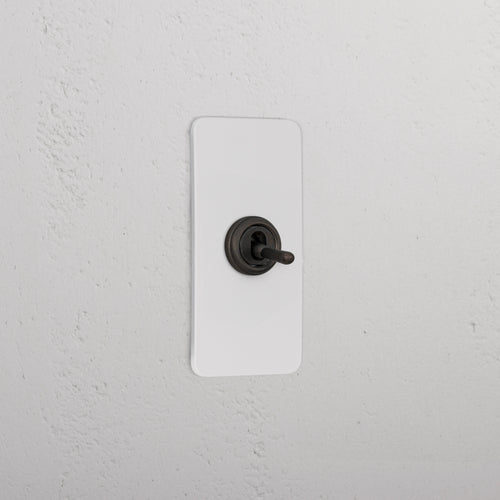 1G Architrave Two Way Toggle Switch - Paintable Bronze