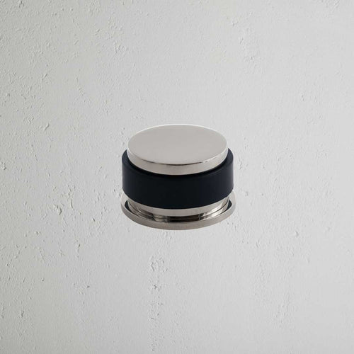 Polished Nickel Seymour Door Stop On White Background